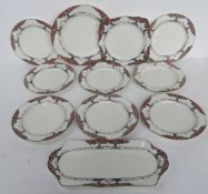 A Crown Ducal high tea service in orange tree pattern having eight plates,
