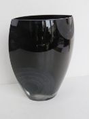 A contemporary black and clear art glass vase standing 25.5cm high.