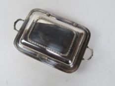 A silver plated tureen having hinged lid, indistinct maker's mark (Made in England).