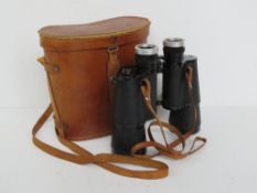 A pair of vintage Zenith 20 x 50 field 3 binoculars No 83162 with original pigskin leather strap