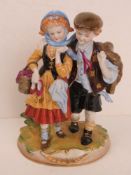 A Dresden Porcelain large figurine of girl and boy,