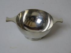 A silver plated quiache.