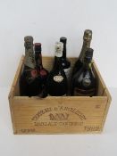 A quantity of assorted bottles of alcohol including Harrod's Mont-Marcal Cava,