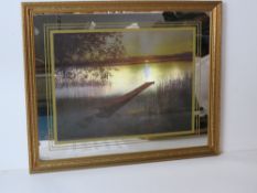 A foil picture with mirrored edge in frame, overall size 55 x 45cm.