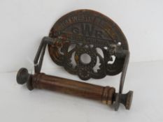 A contemporary GWR themed toilet roll holder.