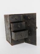 Vintage metal lock box opening to reveal 4 drawers within measuring approx. 17.5 x 27 x13cm.