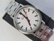 A men's stainless steel Mondaine wrist watch.