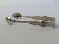 A pair of hallmarked silver sugar tongs, HM for Birmingham and measuring approx 8.2cm in length.
