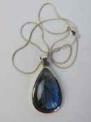 A labradorite pendant stamped 925 and measuring approx 5cm inc bale on 925 silver chain.