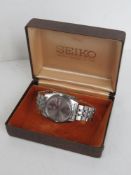 A stainless steel Seiko 5 automatic wrist watch with day and date apertures in original