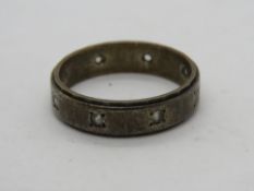 A 9ct gold and silver ring set with white stones, size L-M.