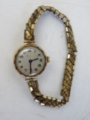 A ladies 9ct gold wrist watch on expanding bracelet,