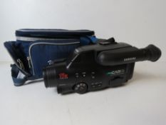 A Samsung Mycam K70 8mm video camera recorder with associated case.