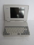 A vintage Toshiba T1950CT/200 System Unit laptop. No cables.