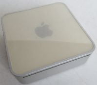An Apple Mac mini. No cables.