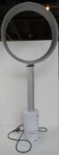 A Dyson floor standing fan.