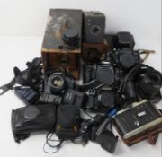 A quantity of assorted cameras and accessories inc Brownie Junior No2, Canon Zenit, etc.