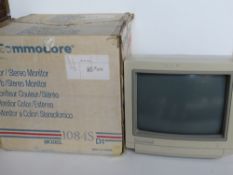 A Commodore Monitor 1084S in original case with packaging.