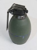 An inert British Schermuly practice grenade, marketed by Schermuly as a stun grenade, fuse unscrews.
