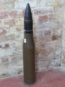An inert British 20pr AP/ CBC Mk 1/2 shell, case dated 1955, some dents noted to projectile.