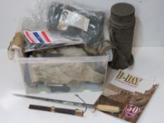 A quantity of assorted militaria inc; gas mask with filter in tin, antique pistol woodwork,