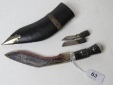 A Gurkha Kukri knife with scabbard, with the Karda and Chakmak blades,