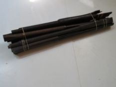 Eight assorted gun woodwork.