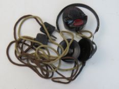 A WWII German head set with mic, head set bears makers code Dfh.a. and dated 1942.