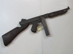 A deactivated Thompson M1A1 SMG.