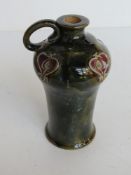 A Doulton Lambeth Artware whiskey jug standing 20.
