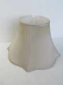 A cream silk lampshade approx 41cm wide.