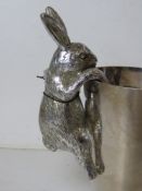 A silver painted rabbit wine cooler decoration, as new with tag.