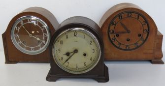 Three vintage mantle clocks, two with wooden cases and one with Bakerlite case, a/f.