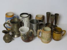 Two silver plated tankards, a pewter tankard, brass 'glasses' and other assorted tankards.