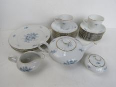 A quantity of assorted dinner and tea wares in blue floral pattern by KPM Krister Germany.