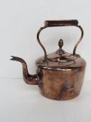 A copper kettle approx 28cm wide to spout.