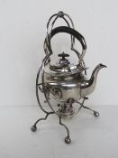 A silver plated teapot with stand and spirit burner, a/f.