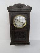 A Royal Aporo wall clock having silvered dial with black Arabic numerals upon,