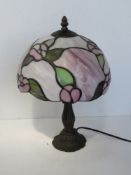 A Tiffany style Art Nouveau influence table lamp with leaded glass shade,