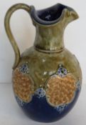 A Royal Doulton Lambeth jug standing approx 19cm high having fluted rim and gilt decorated panels.