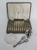A pair of silver plated grape scissors together with a boxed set of salad knives and forks,