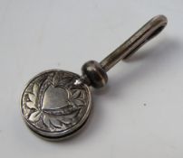 A hallmarked silver napkin holder.