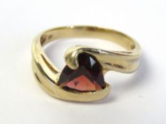 A 9ct gold and garnet ring,