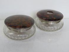 A pair of HM silver faux tortoiseshell and cut glass dressing table pots.
