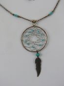 A Native American dream catcher necklace, Navajo style, stamped 925 to the clasp.