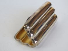 A hallmarked silver cigar case having gilt interior and space for three cigars.