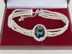 A recreation of Princess Diana's pearl choker necklace,