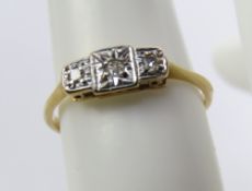An early 20th century 18ct and Platinum diamond ring,