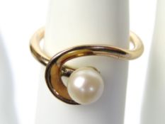 A cultured pearl ring,