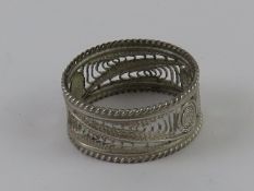 A Maltese silver filigree ring, band measuring 9mm wide, hallmarked 925, size Q.